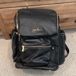 JuJuBe Faux Leather Forever Diaper bag in Black with Gold Hardware.